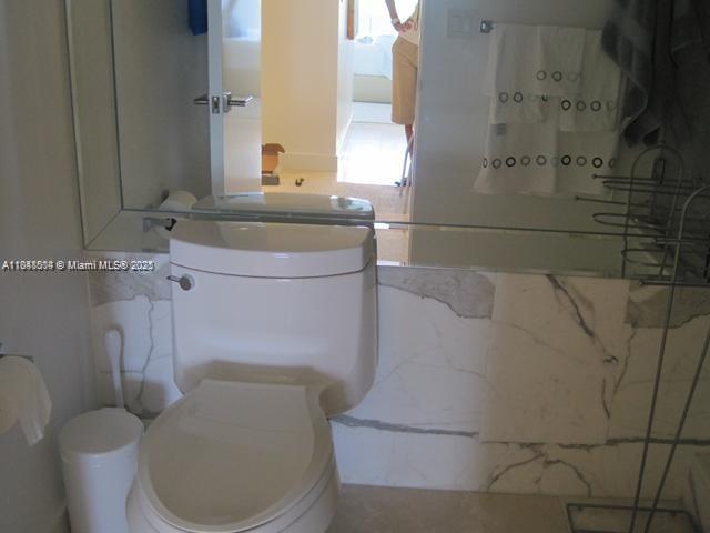 199 Ocean Ln Drive, Unit 1114 Key Biscayne, FL 33149 - Photo 11 of 14 a bathroom with a toilet and a sink