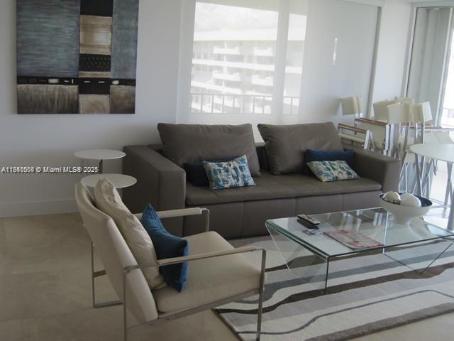 199 Ocean Ln Drive, Unit 1114 Key Biscayne, FL 33149 - Photo 7 of 14 a living room with furniture and a window
