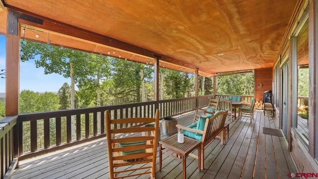 a view of a two chairs in the deck