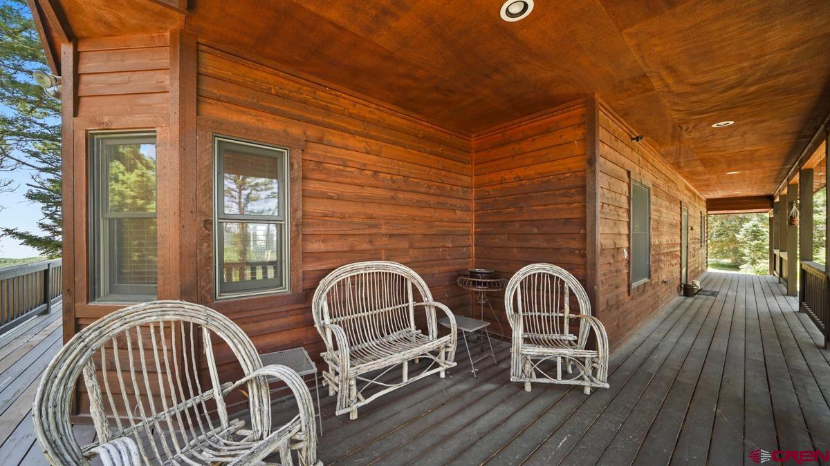 220 Ridge Road Cimarron, CO 81220 - Photo 32 of 45 a view of a chairs on the deck