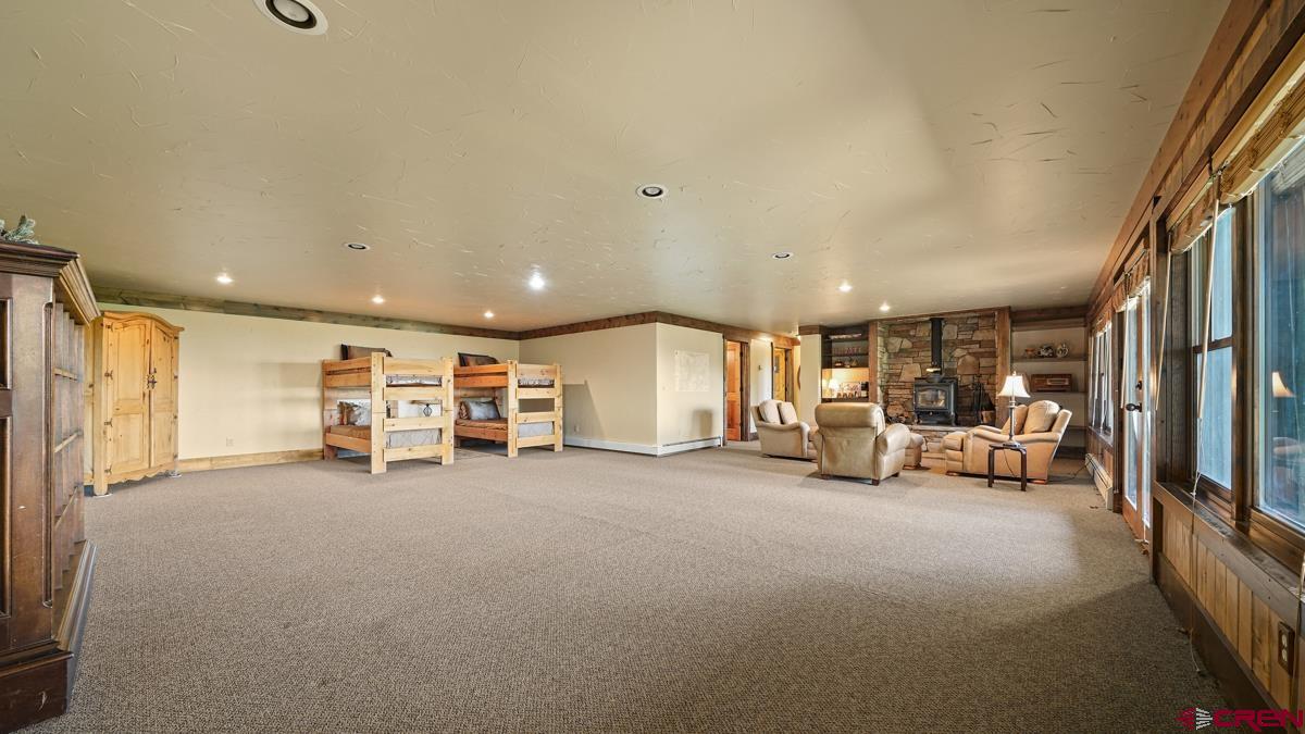 220 Ridge Road Cimarron, CO 81220 - Photo 35 of 45 a view of a livingroom with furniture and a ceiling fan