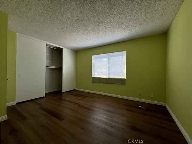a view of a bathroom with a sink and a mirror