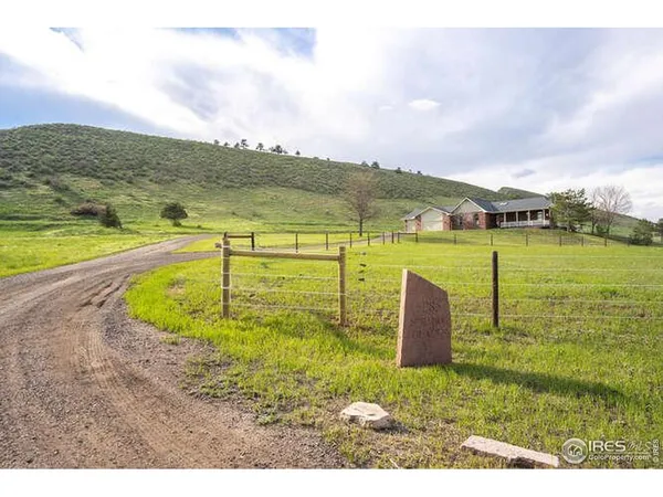 a view of a swimming pool with an ocean view