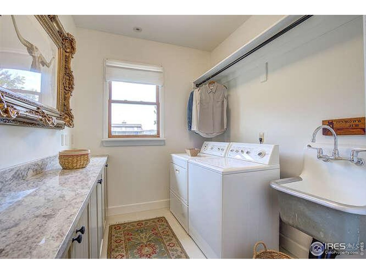 6085 Spring Glade Road Loveland, CO 80538 - Photo 25 of 40 Main floor laundry room