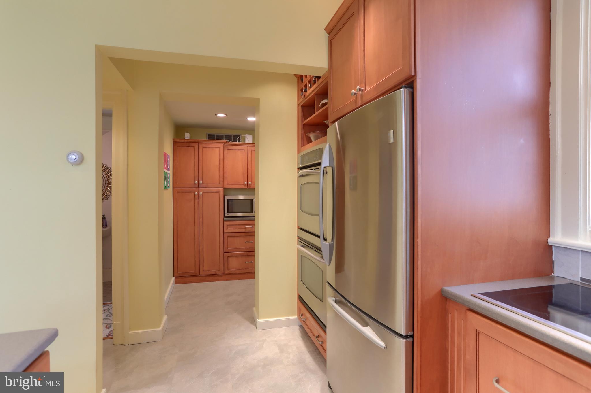 3 East High Street Lebanon, PA 17042 - Photo 15 of 54 a view of a kitchen with a refrigerator and a sink