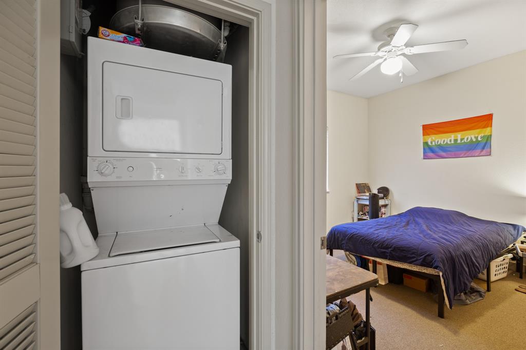 711 West 26th Street, Unit 700 Austin, TX 78705 - Photo 8 of 19 a workspace with furniture and chandelier