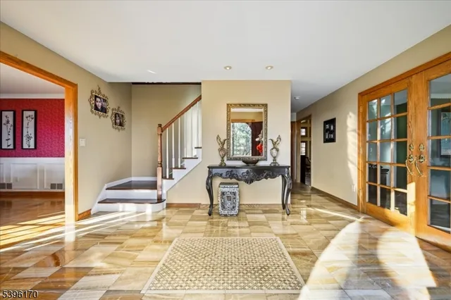 a view of a living room and kitchen