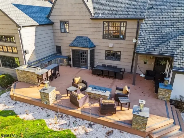 a view of a dinning table and chairs in the patio