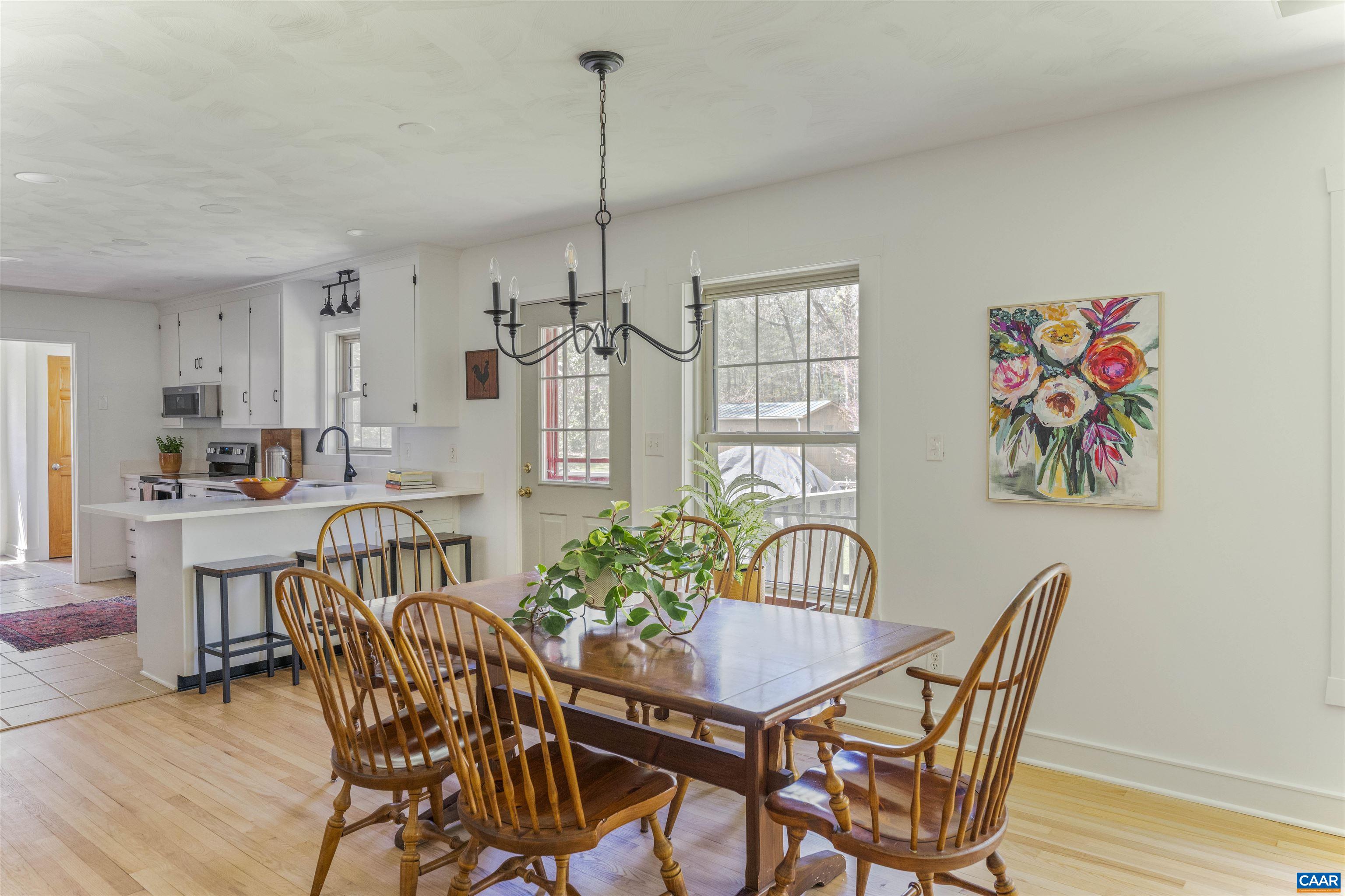 5138 Free Union Road Free Union, VA 22940 - Photo 11 of 55 a view of a dining room with furniture window and wooden floor