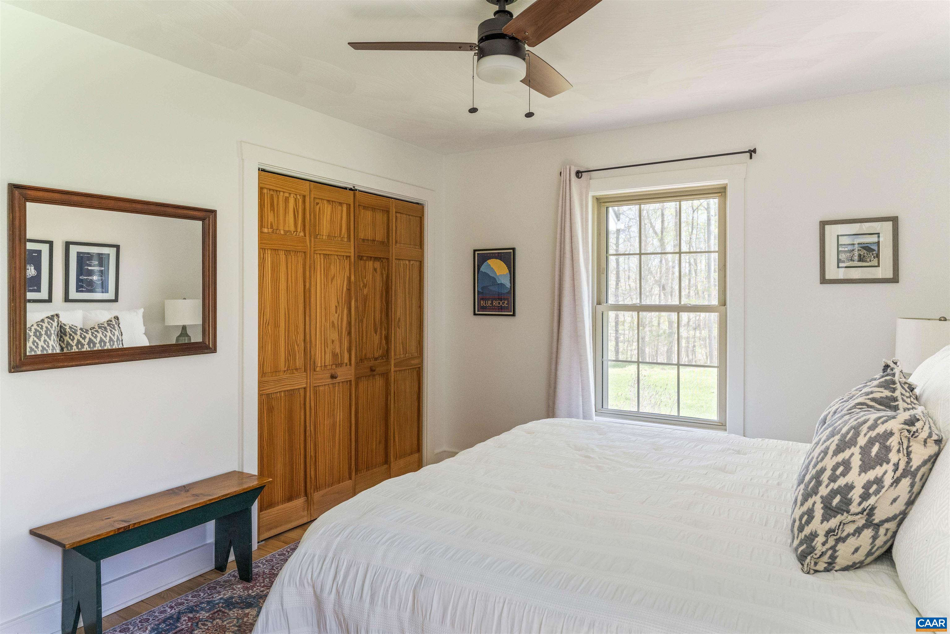 5138 Free Union Road Free Union, VA 22940 - Photo 23 of 55 a bedroom with a bed and a window