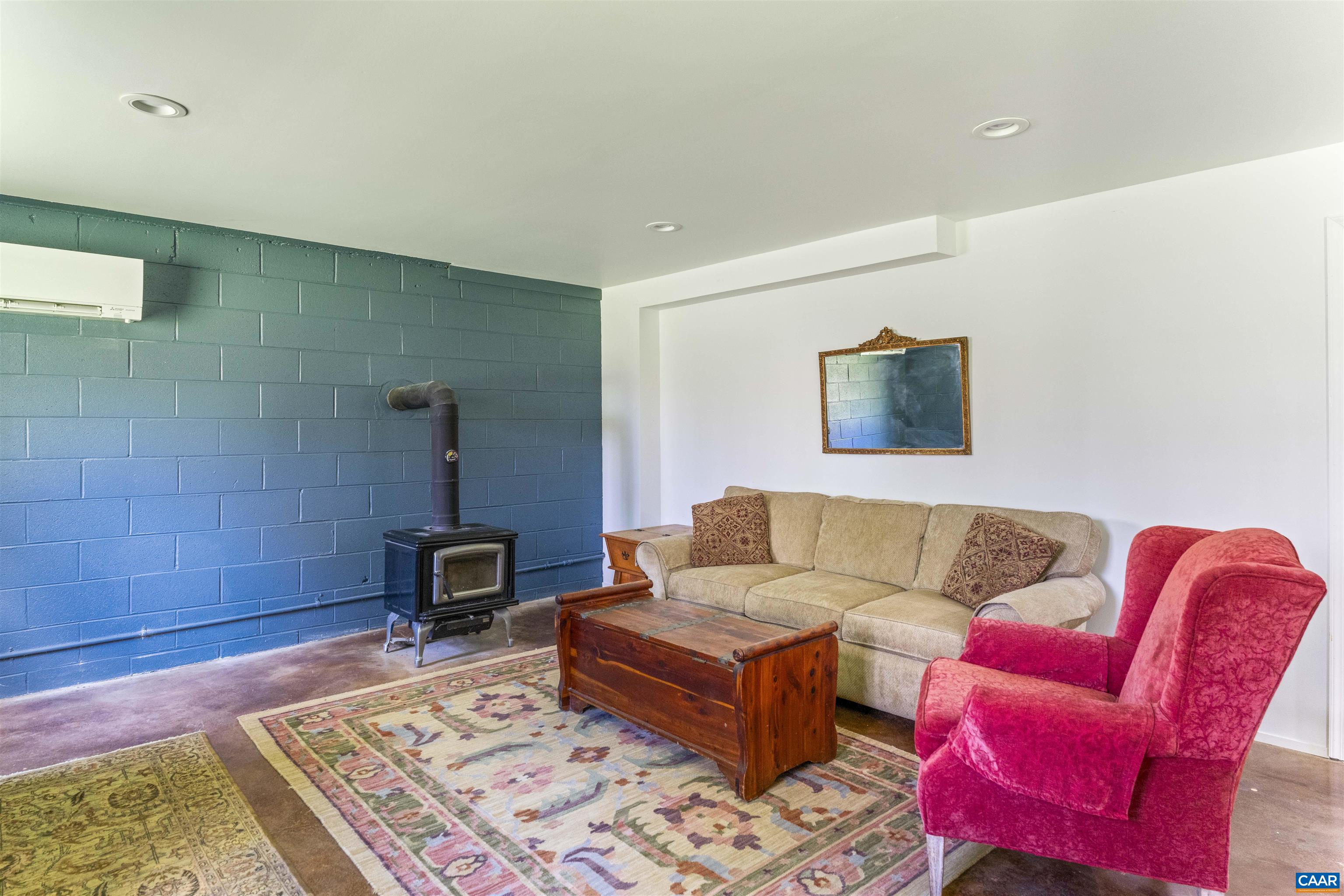 5138 Free Union Road Free Union, VA 22940 - Photo 30 of 55 a living room with furniture and a rug