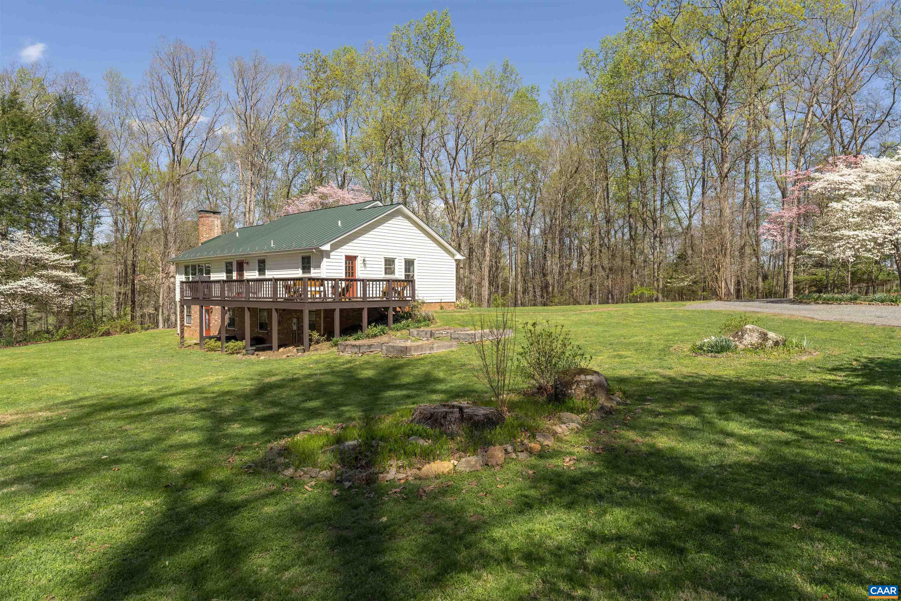 5138 Free Union Road Free Union, VA 22940 - Photo 39 of 55 a view of a house with a big yard and large trees