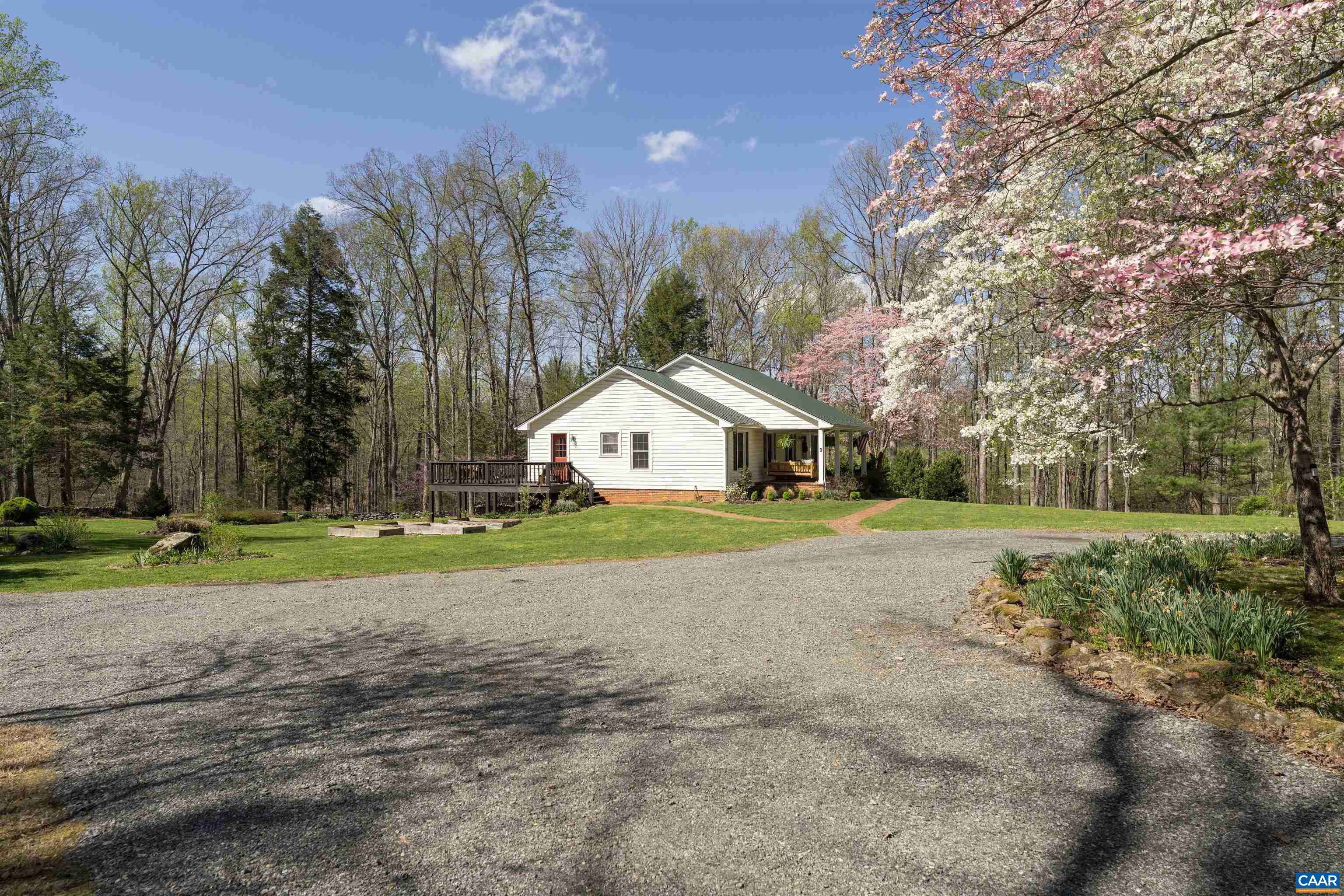 5138 Free Union Road Free Union, VA 22940 - Photo 42 of 55 a house with green field in front of it