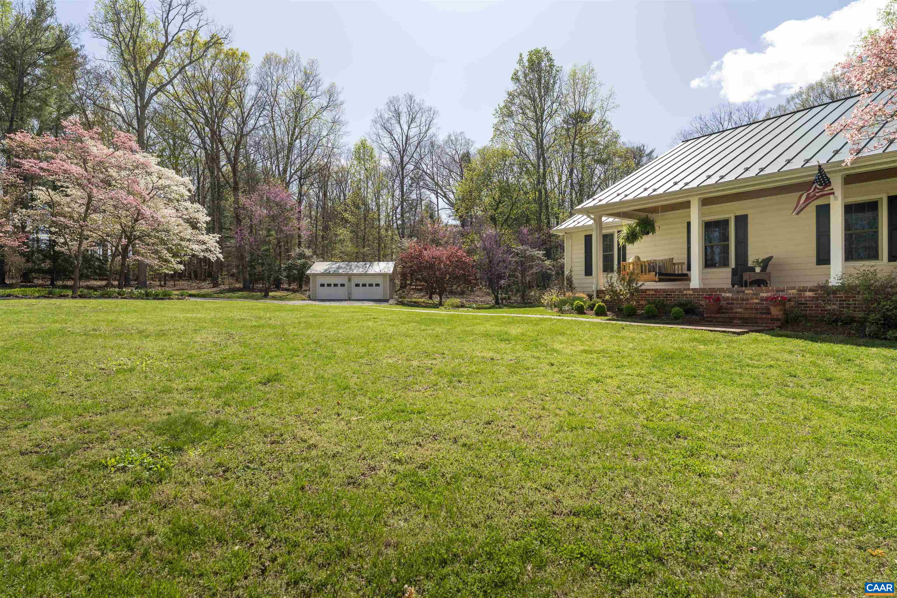 5138 Free Union Road Free Union, VA 22940 - Photo 45 of 55 a view of a house with a big yard and potted plants