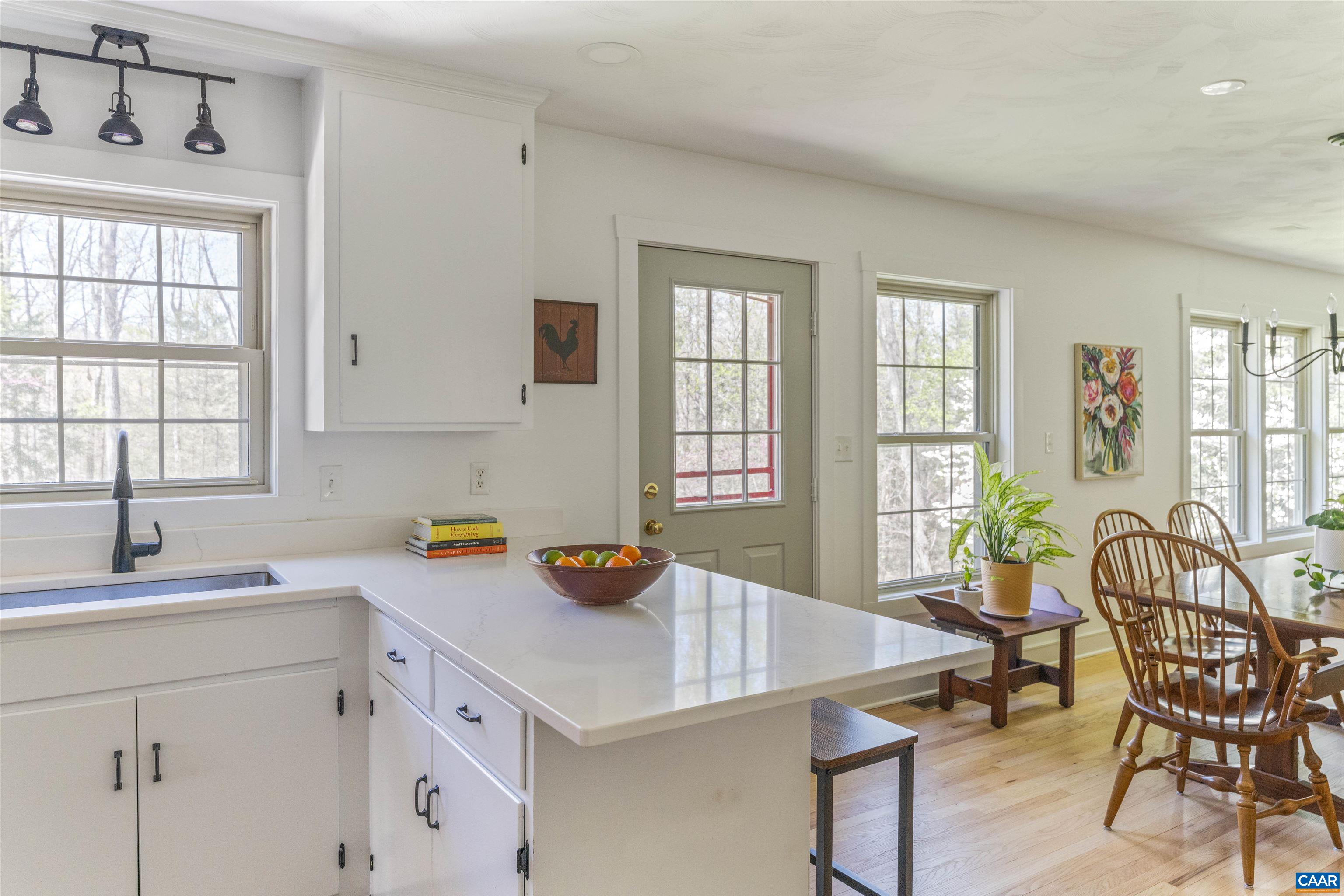 5138 Free Union Road Free Union, VA 22940 - Photo 10 of 55 a kitchen with a table chairs and window