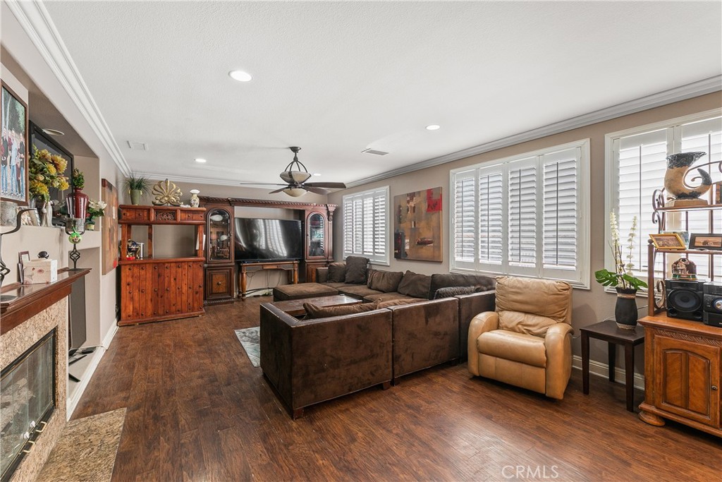 26266 Beecher Lane Stevenson Ranch, CA 91381 - Photo 7 of 25 a living room with furniture and a flat screen tv