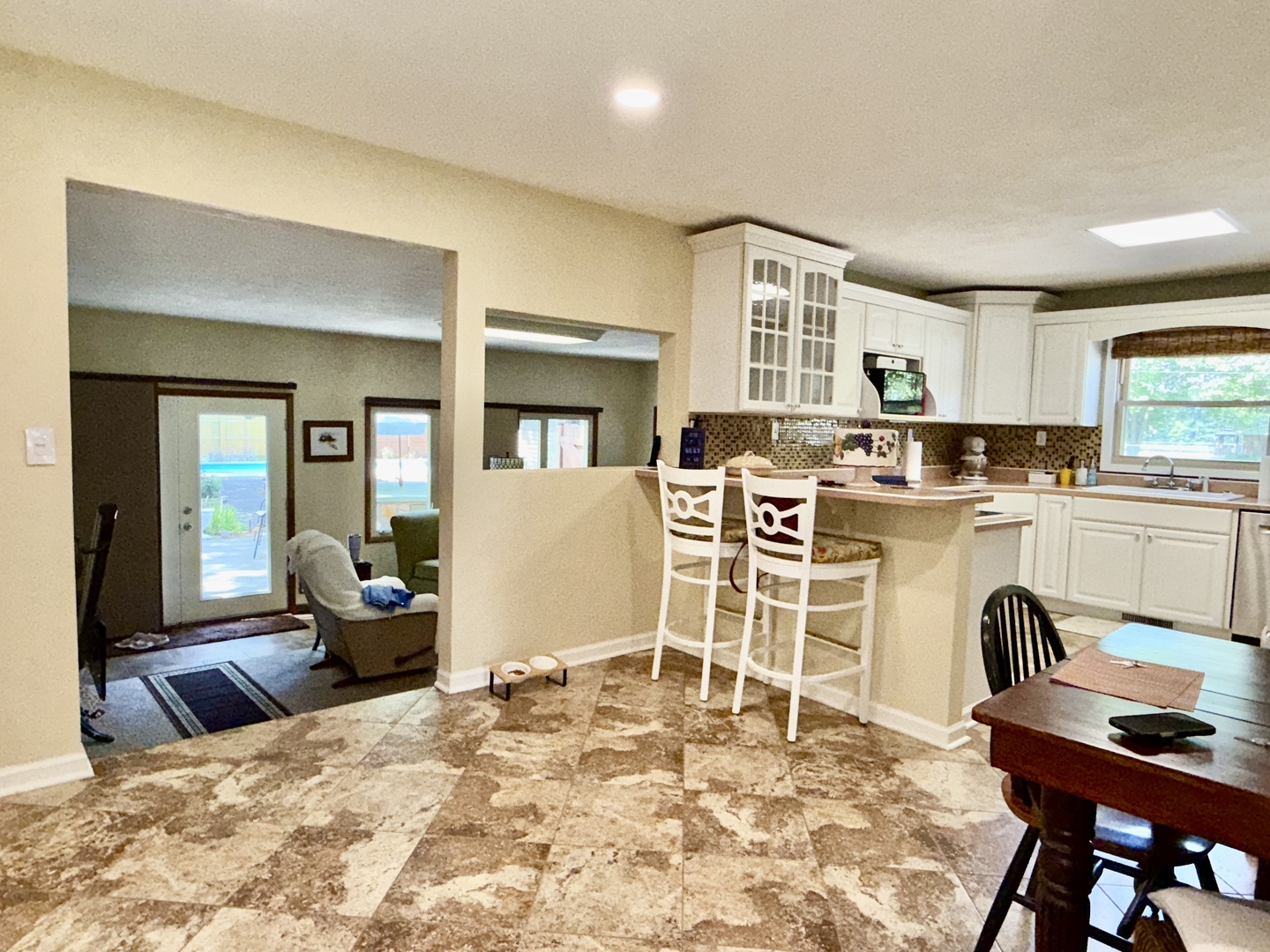 956 Country Club Road Metropolis, IL 62960 - Photo 8 of 48 a kitchen with a dining table chairs and refrigerator