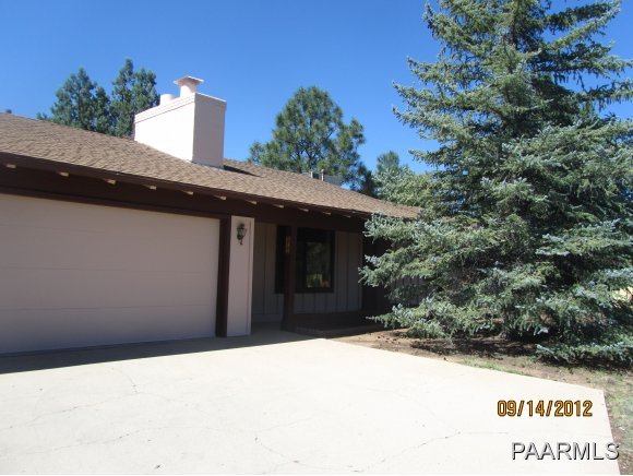 912 Forest Hylands Road, Unit 1 Prescott, AZ 86303 - Photo 1 of 10 a backyard of a house