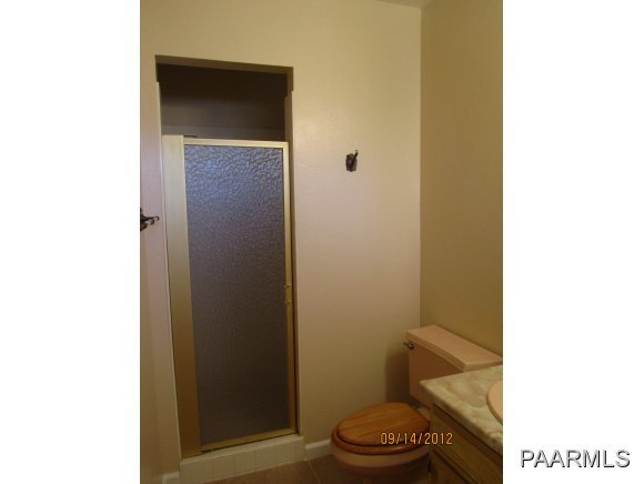 912 Forest Hylands Road, Unit 1 Prescott, AZ 86303 - Photo 6 of 10 a bathroom with a toilet