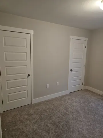 an empty room with closet