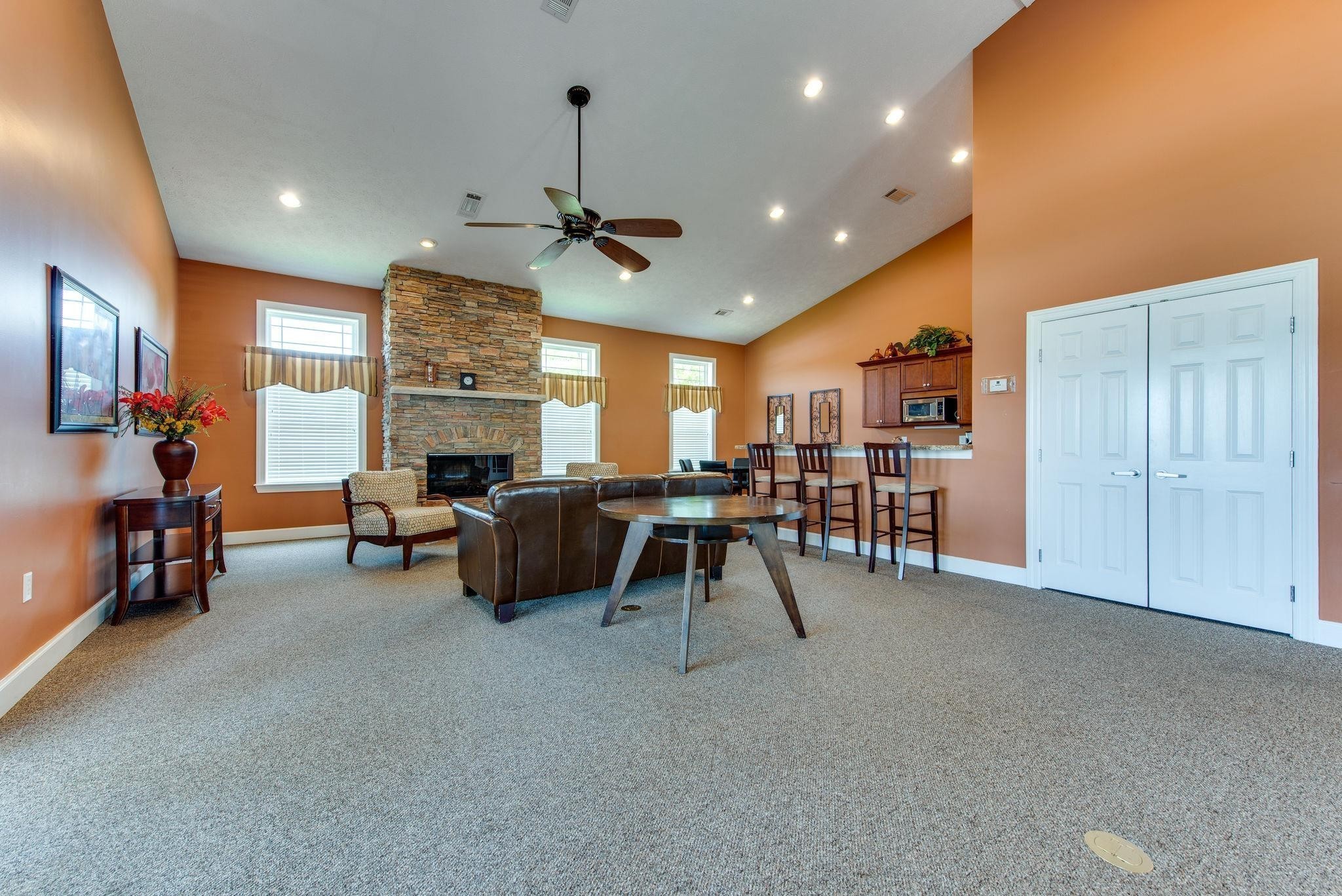 6008 Hillside Lane Spring Hill, TN 37174 - Photo 20 of 32 a living room with furniture and a flat screen tv