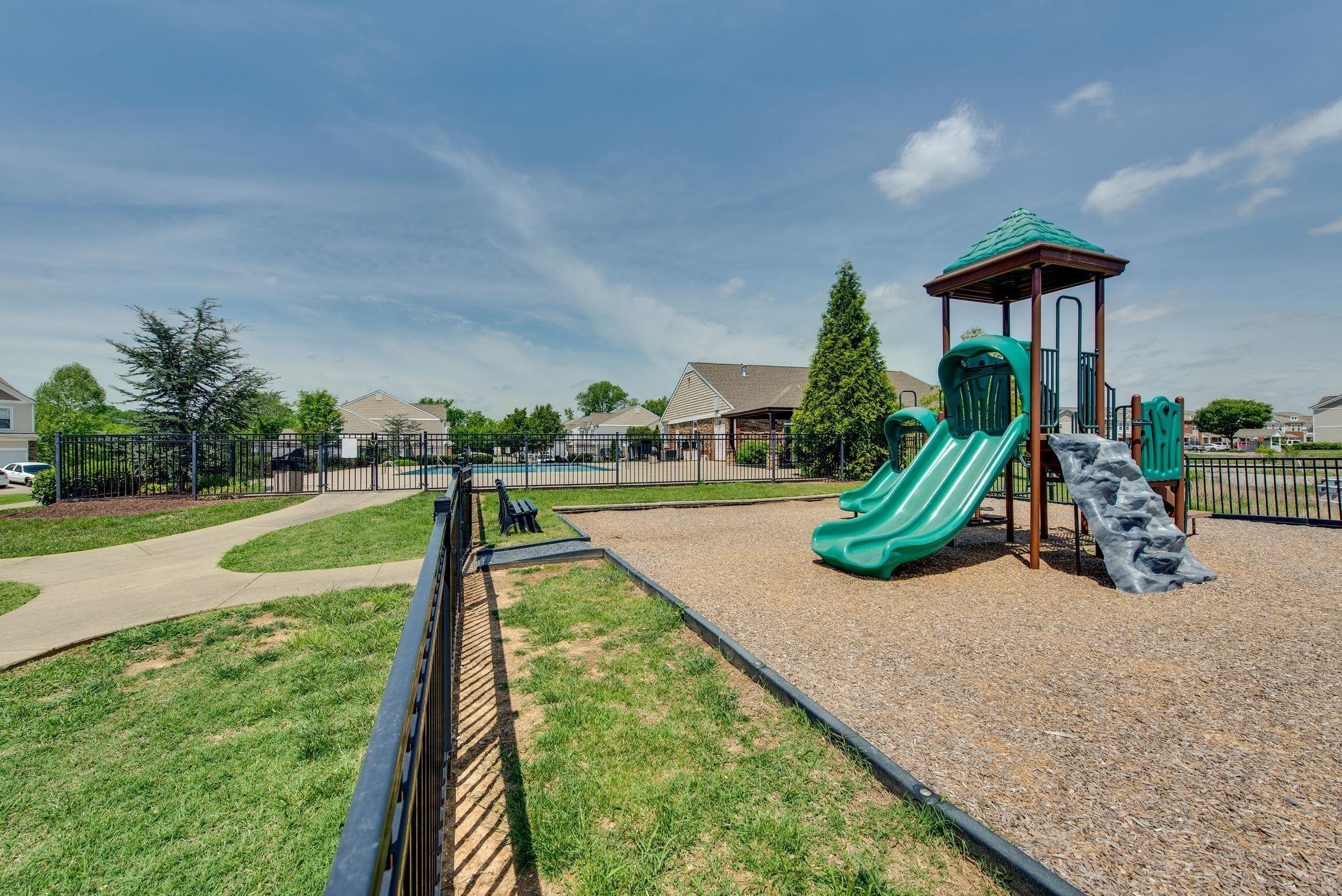 6008 Hillside Lane Spring Hill, TN 37174 - Photo 21 of 32 a view of a house with swimming pool and yard