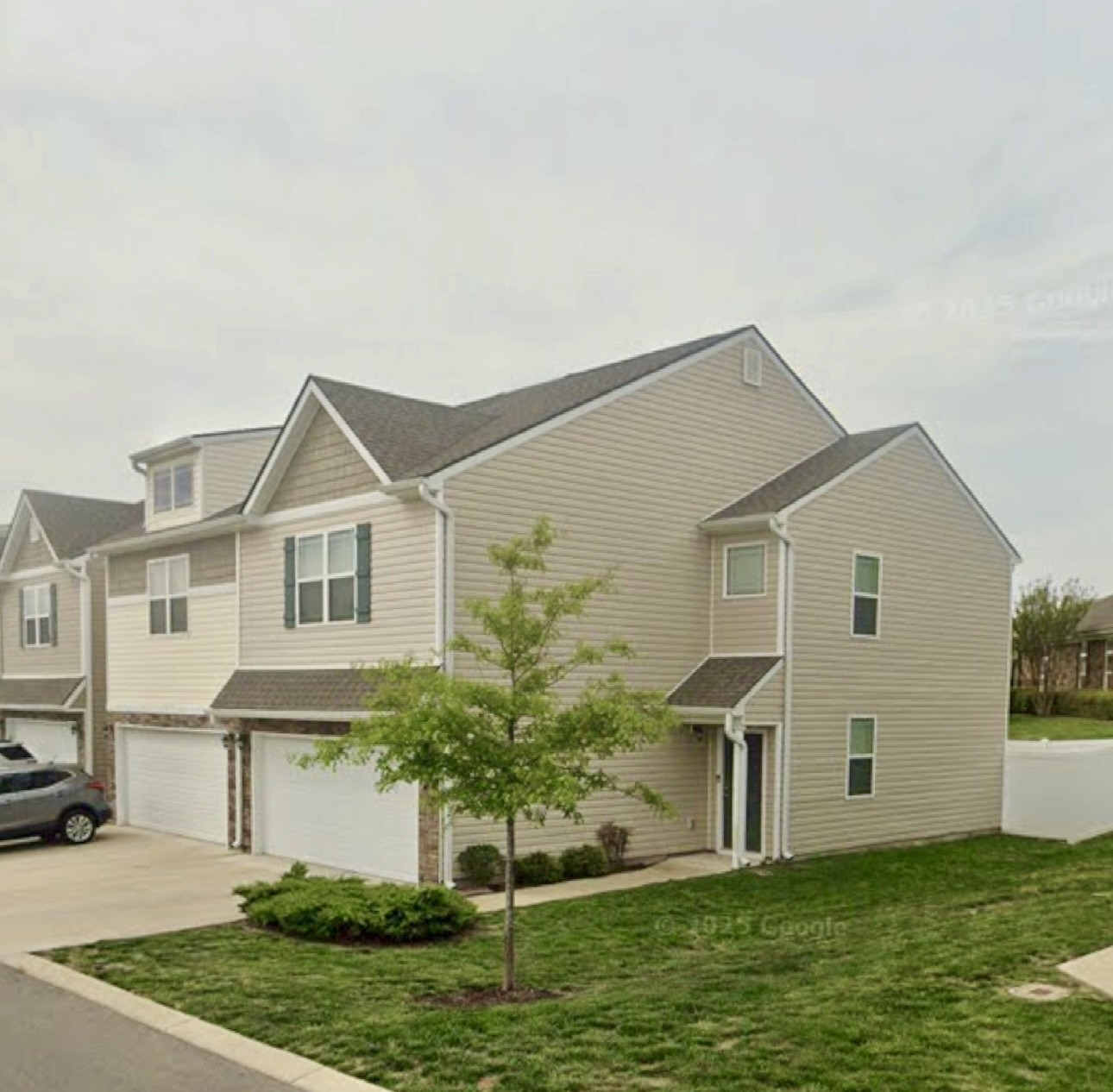6008 Hillside Lane Spring Hill, TN 37174 - Photo 3 of 32 a front view of a house with a yard and garage