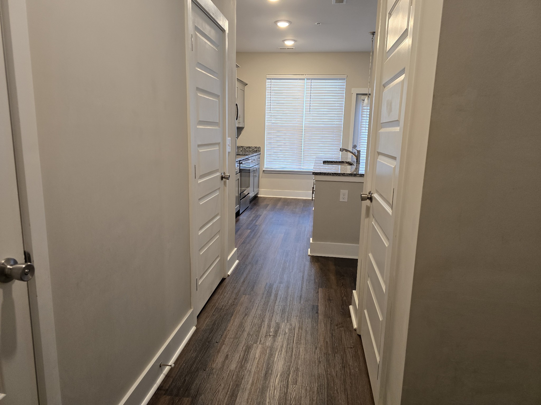6008 Hillside Lane Spring Hill, TN 37174 - Photo 6 of 32 a view of a hallway and wooden floor