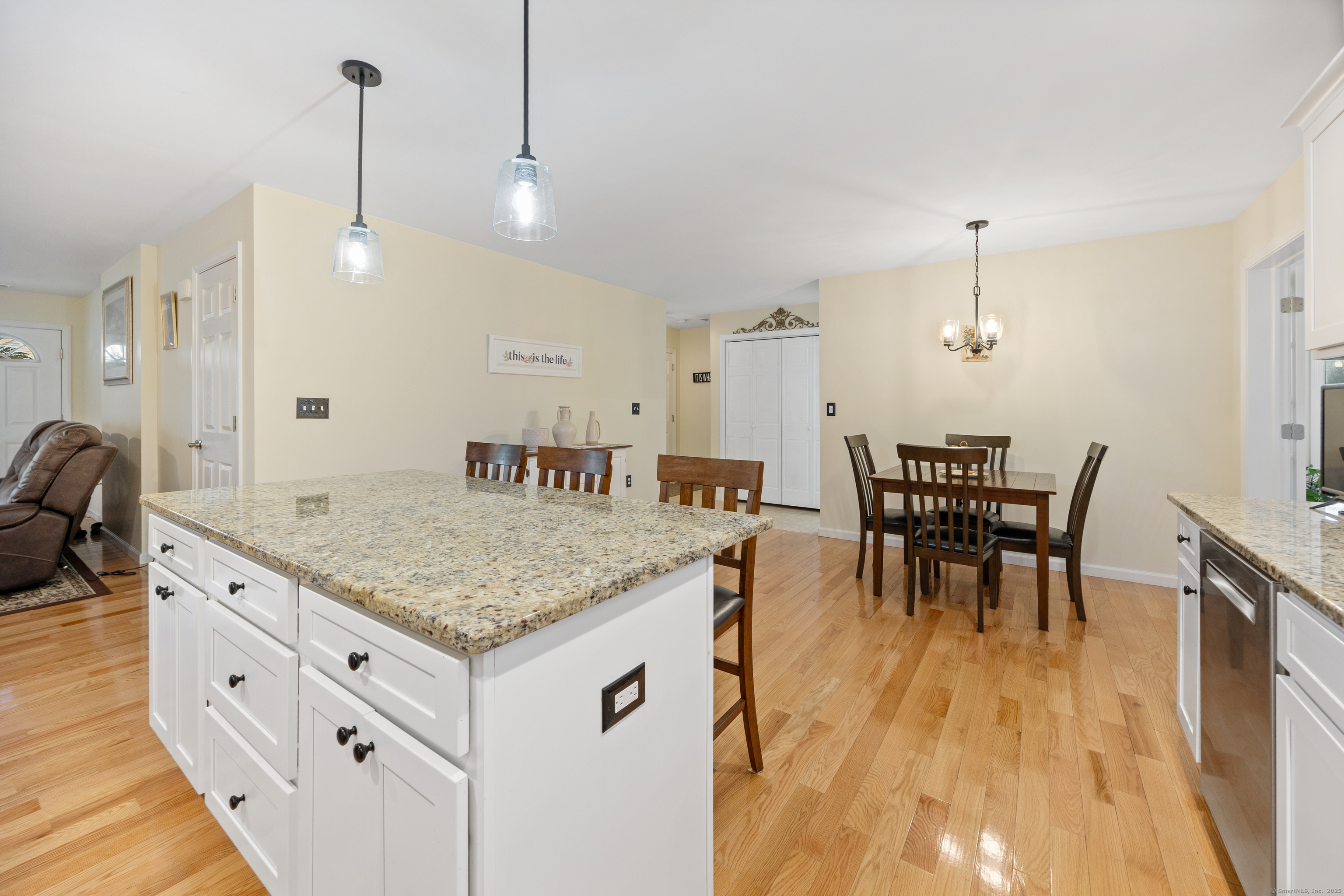 29 Hannah Way Harwinton, CT 06791 - Photo 11 of 34 a kitchen with center island table and chairs