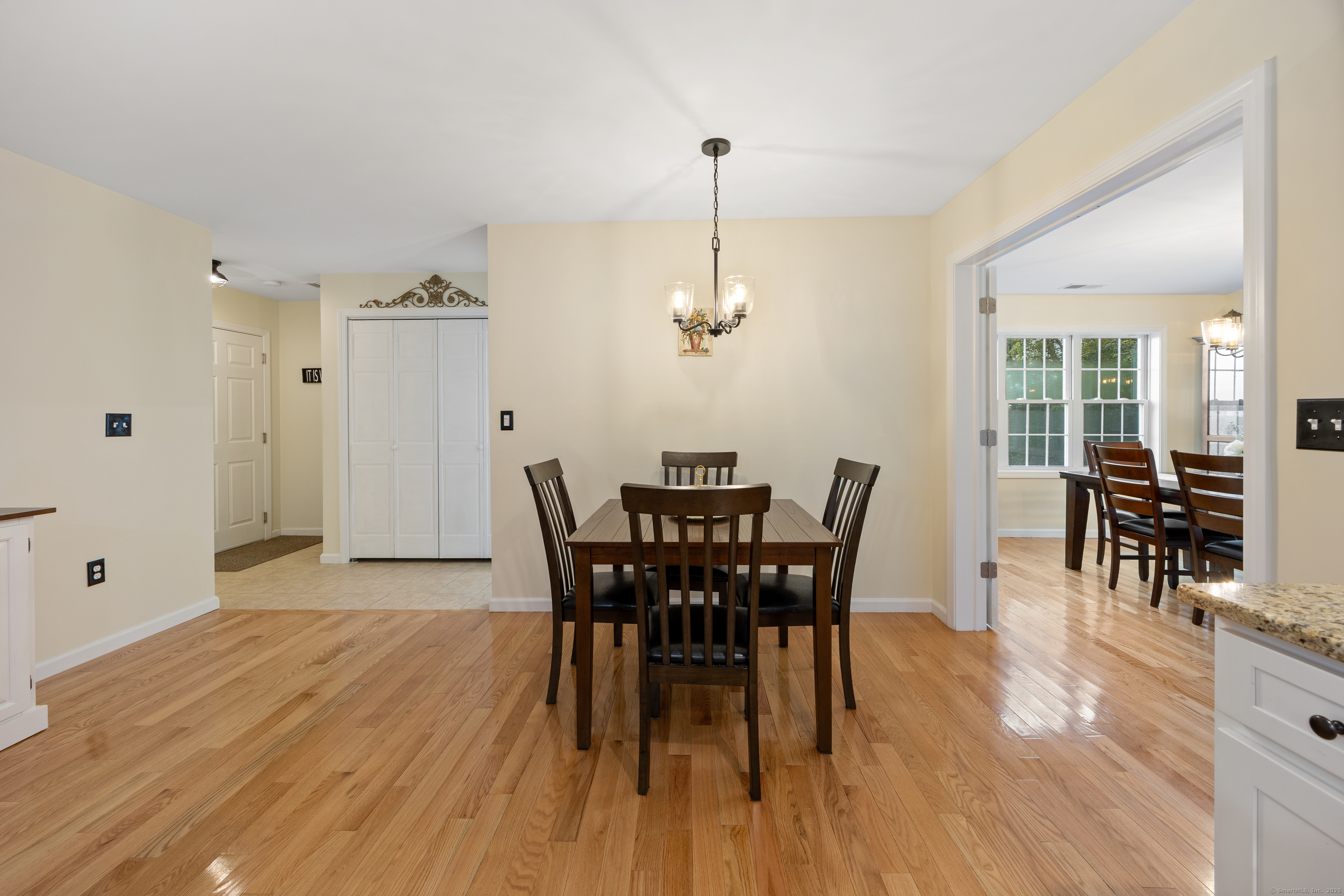 29 Hannah Way Harwinton, CT 06791 - Photo 13 of 34 a view of a dining room with furniture and wooden floor