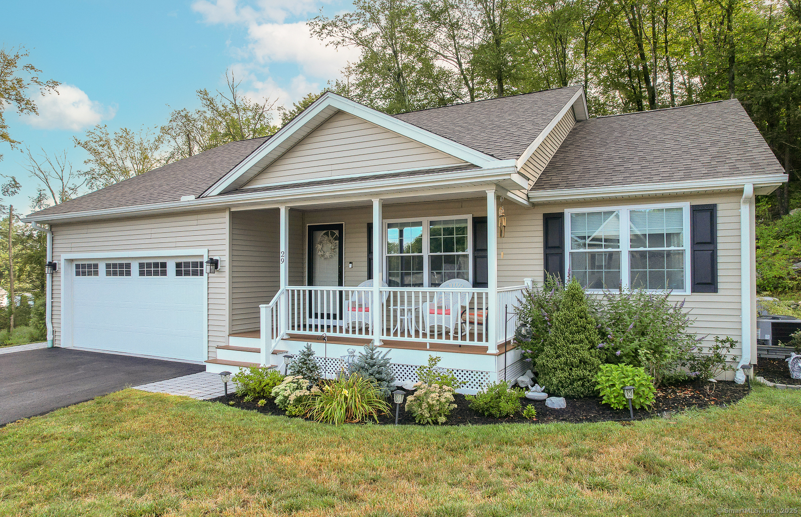 29 Hannah Way Harwinton, CT 06791 - Photo 2 of 34 front view of a house with a yard