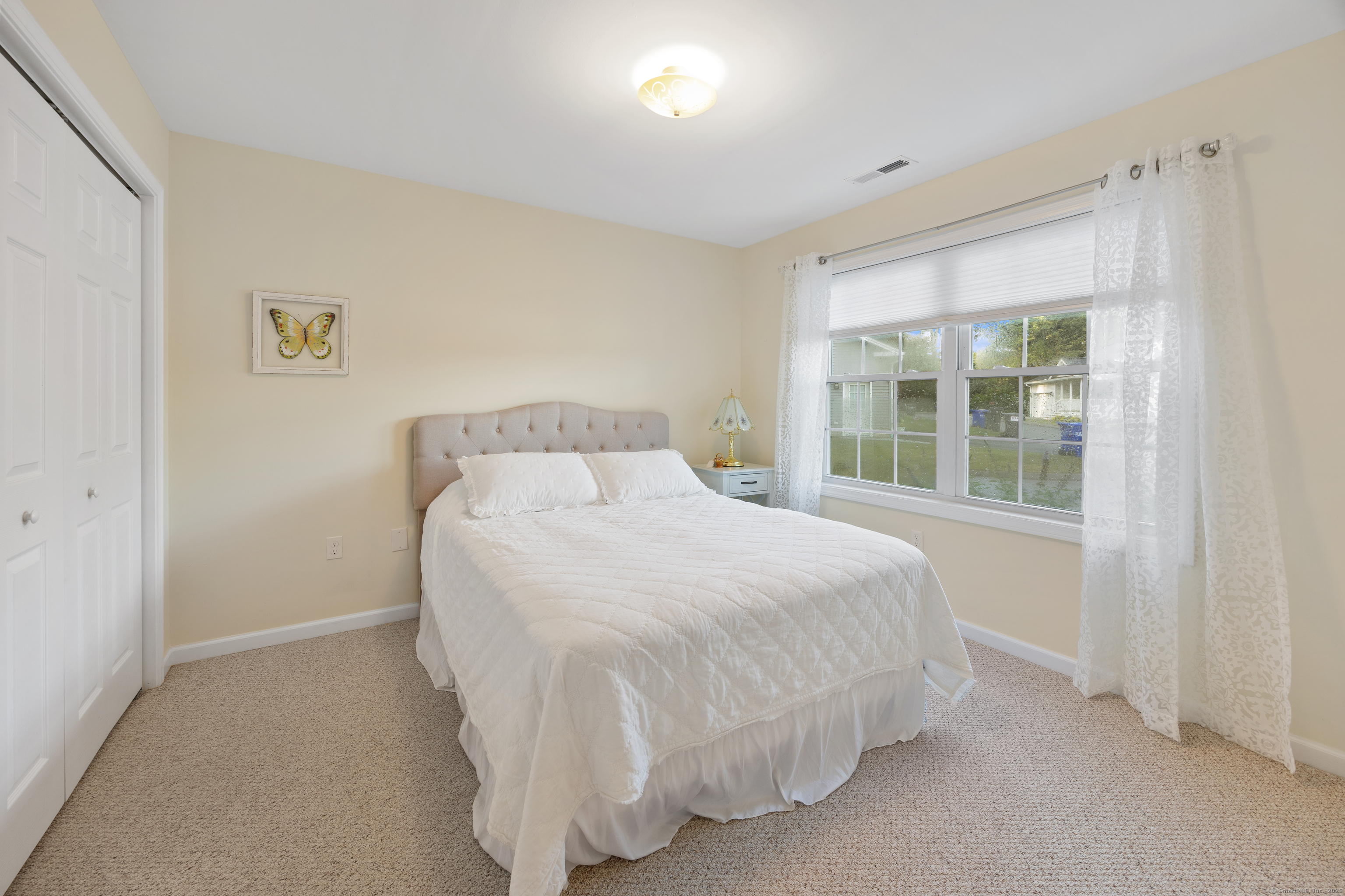 29 Hannah Way Harwinton, CT 06791 - Photo 21 of 34 a bedroom with a bed and a window