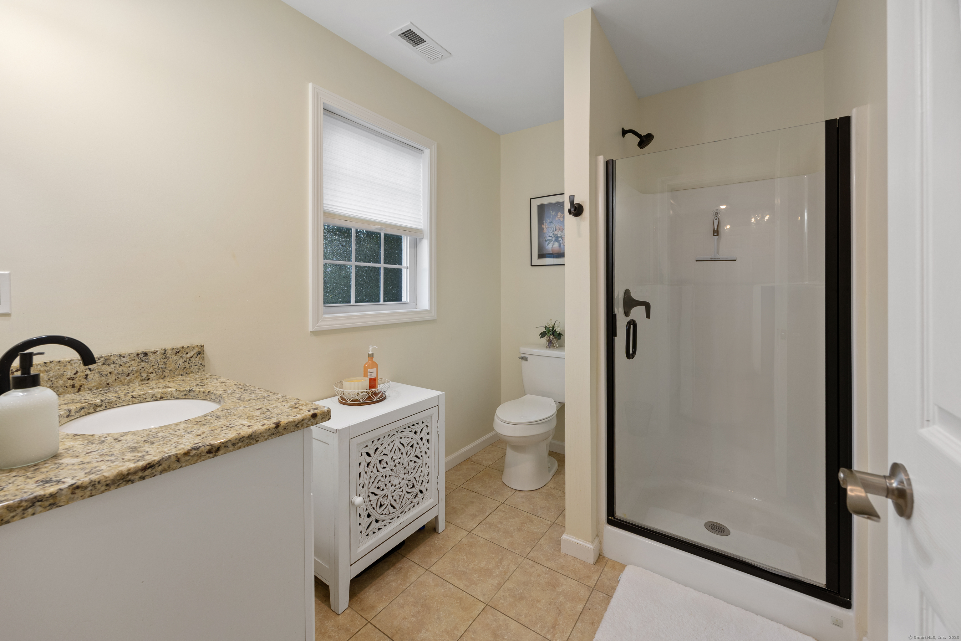 29 Hannah Way Harwinton, CT 06791 - Photo 24 of 34 a bathroom with a sink toilet and shower