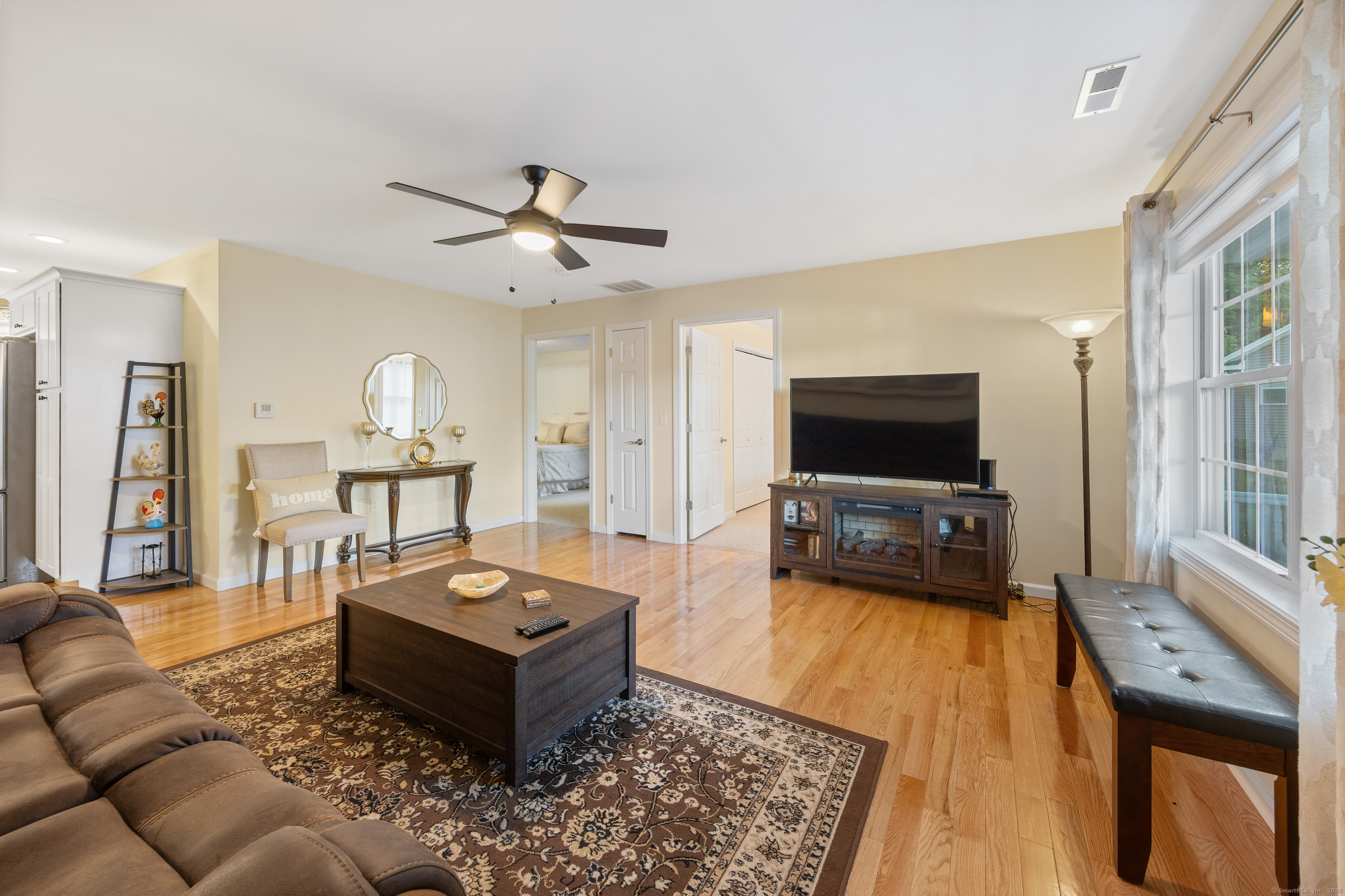 29 Hannah Way Harwinton, CT 06791 - Photo 6 of 34 a living room with furniture and a flat screen tv