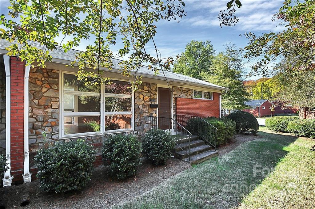 4230 Randolph Road Charlotte, NC 28211 - Photo 1 of 31 front view of a house with a yard