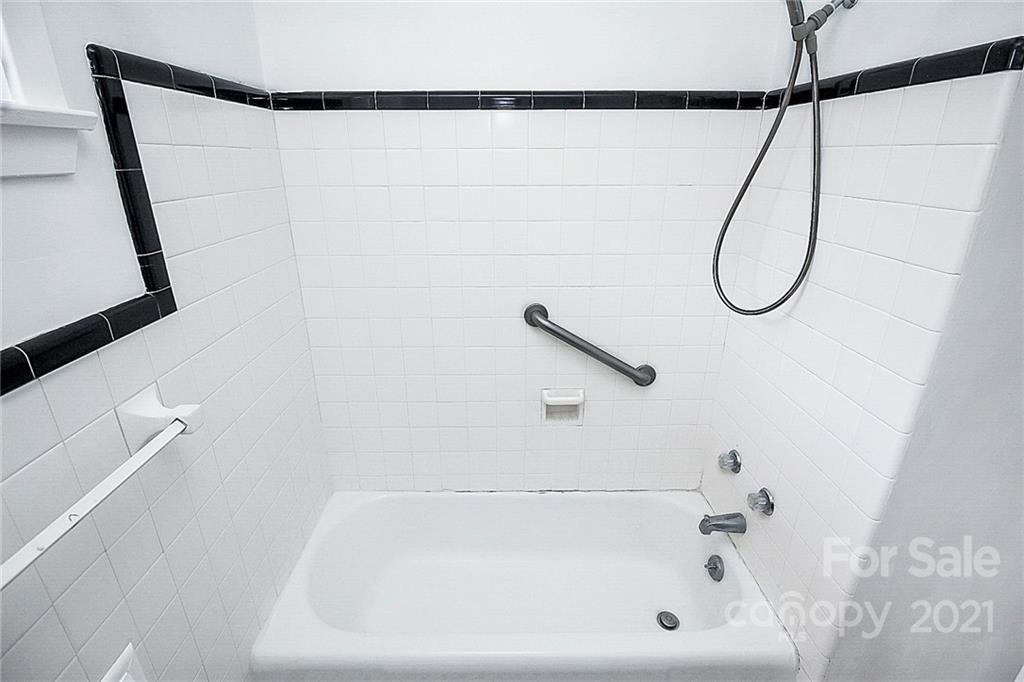 4230 Randolph Road Charlotte, NC 28211 - Photo 19 of 31 a bathroom with a bath tub and a shower