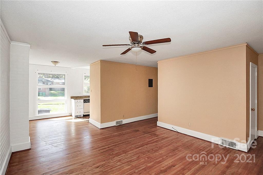 4230 Randolph Road Charlotte, NC 28211 - Photo 3 of 31 a view of empty room with wooden floor