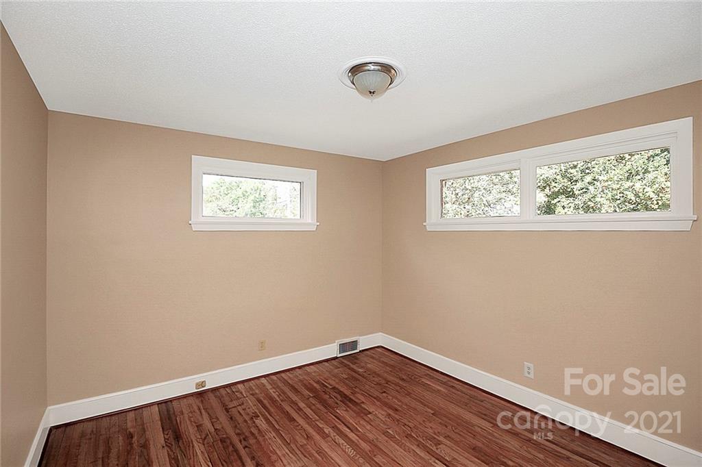 4230 Randolph Road Charlotte, NC 28211 - Photo 23 of 31 a view of a room with wooden floor and windows
