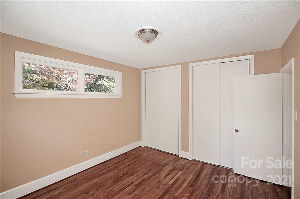 4230 Randolph Road Charlotte, NC 28211 - Photo 26 of 31 a view of an empty room with wooden floor