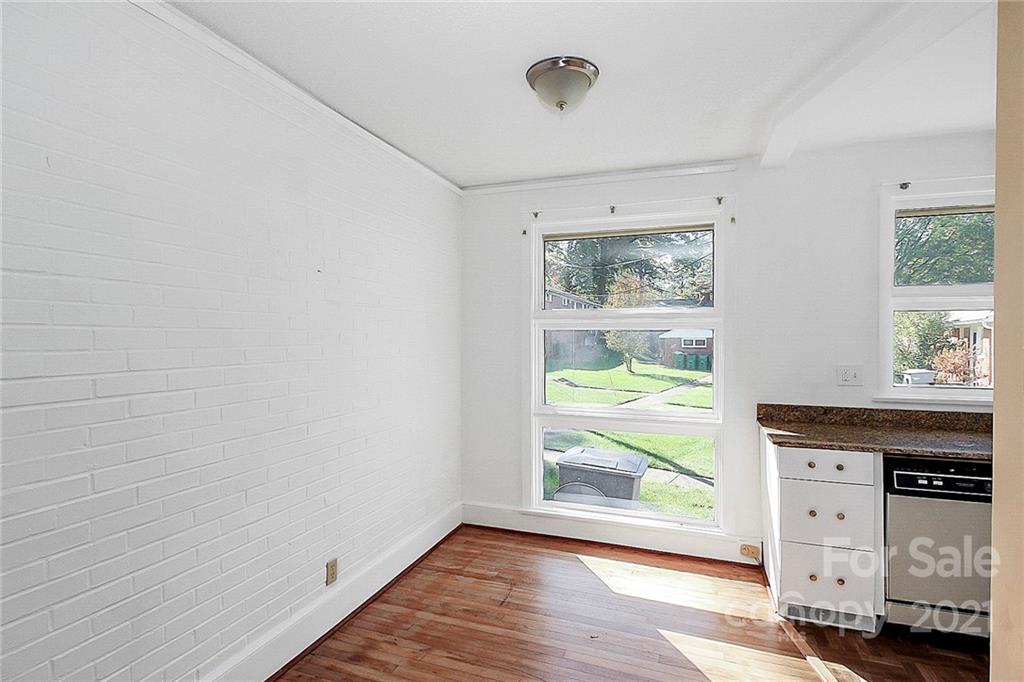 4230 Randolph Road Charlotte, NC 28211 - Photo 7 of 31 a view of room with window and wooden floor