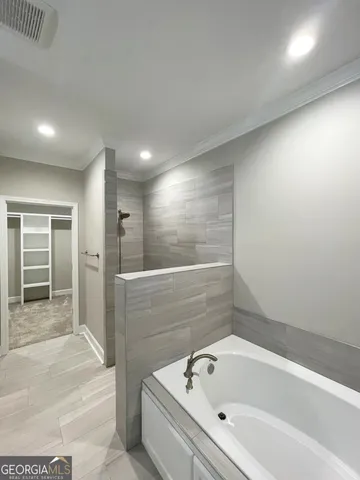 a bathroom with a bathtub