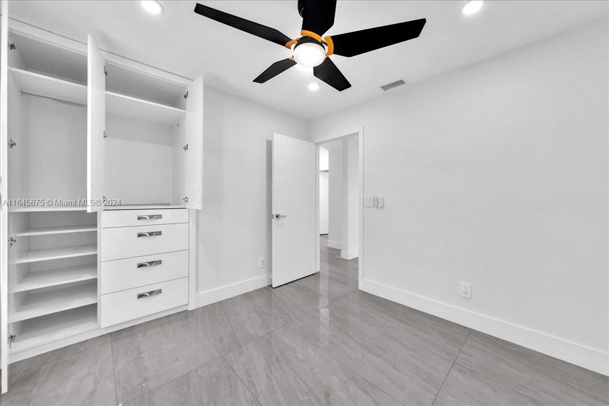 2373 Southwest 177th Terrace Miramar, FL 33029 - Photo 18 of 79 wooden floor in an empty room