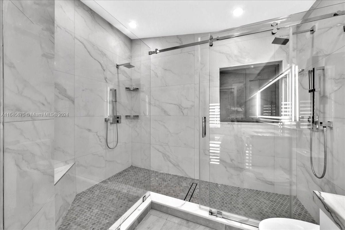 2373 Southwest 177th Terrace Miramar, FL 33029 - Photo 33 of 79 a bathroom with a shower