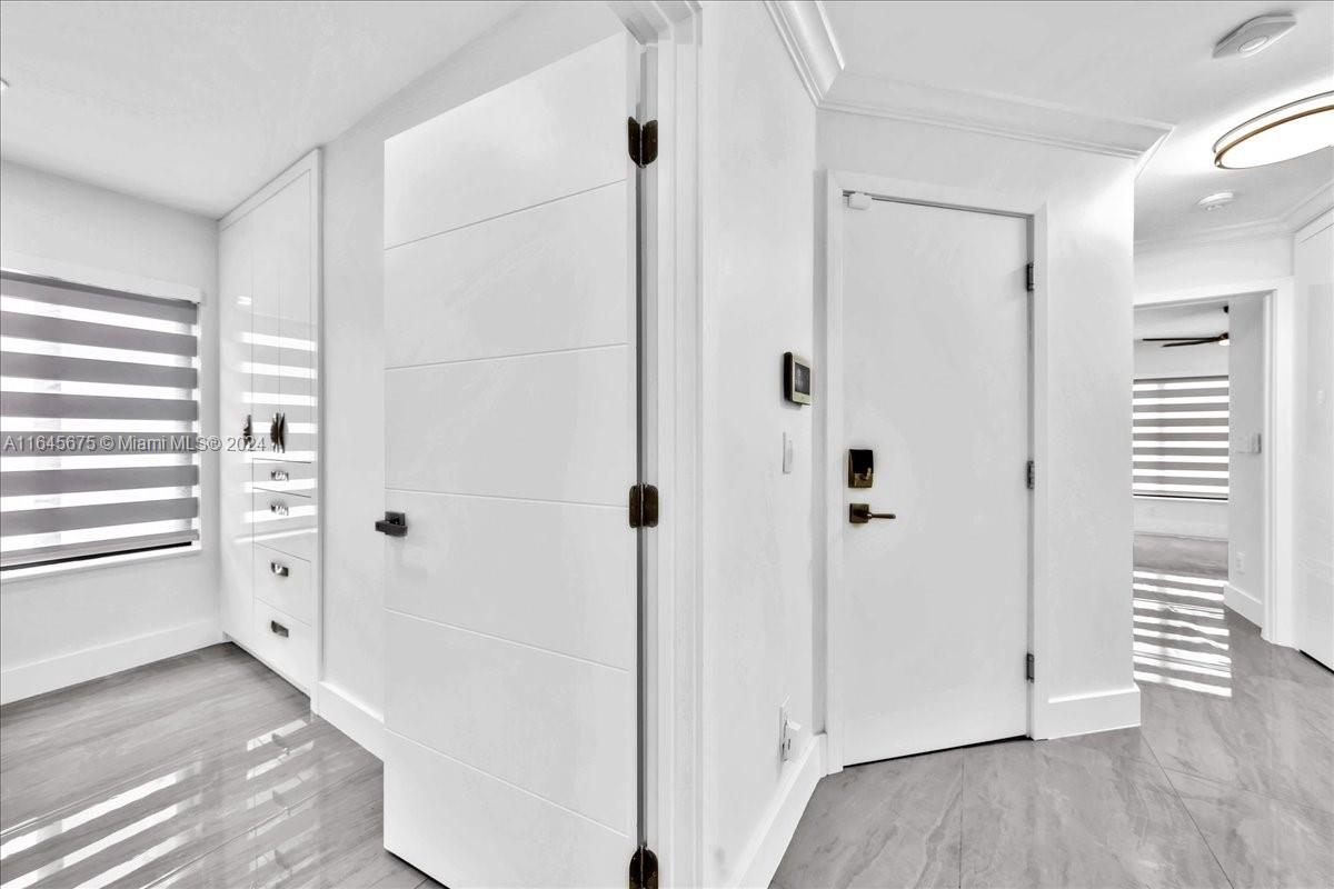 2373 Southwest 177th Terrace Miramar, FL 33029 - Photo 6 of 79 a view of a bathroom with a sink and a mirror