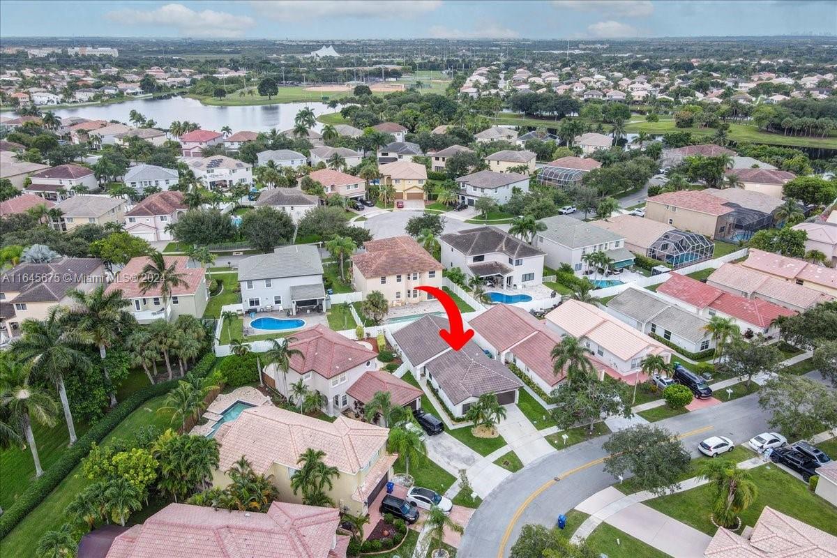2373 Southwest 177th Terrace Miramar, FL 33029 - Photo 74 of 79 an aerial view of a city with lots of residential buildings