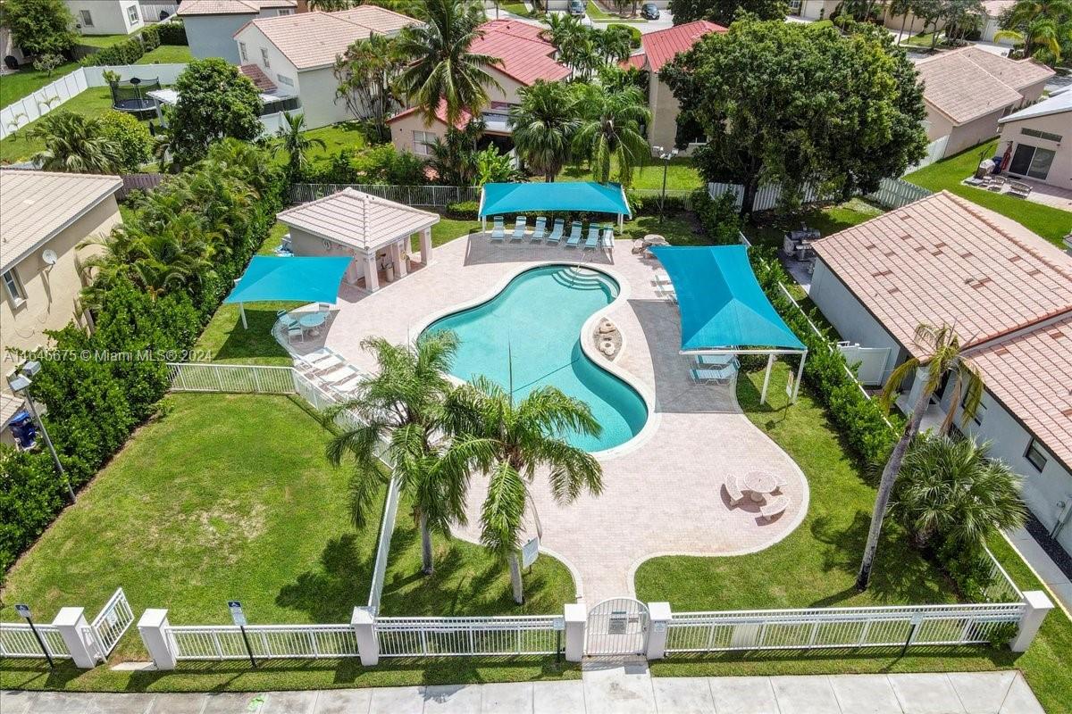 2373 Southwest 177th Terrace Miramar, FL 33029 - Photo 75 of 79 an aerial view of residential house with outdoor space and pool