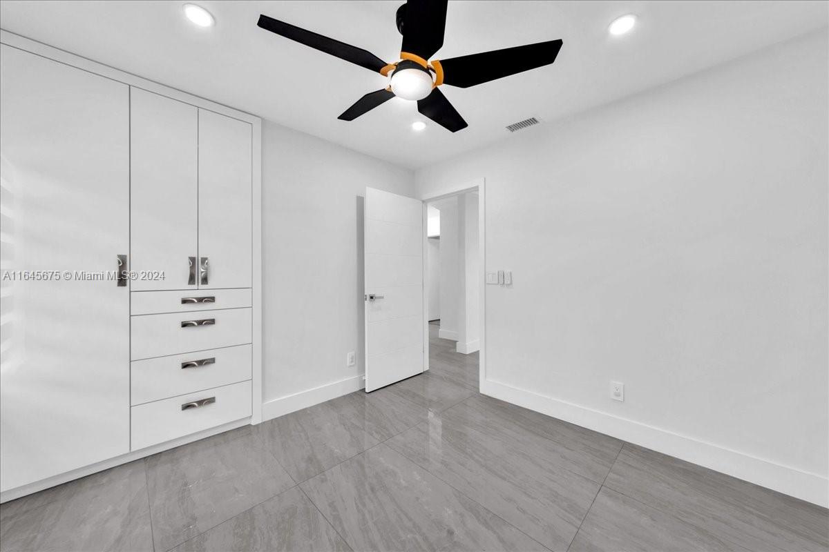 2373 Southwest 177th Terrace Miramar, FL 33029 - Photo 9 of 79 an empty room with fan