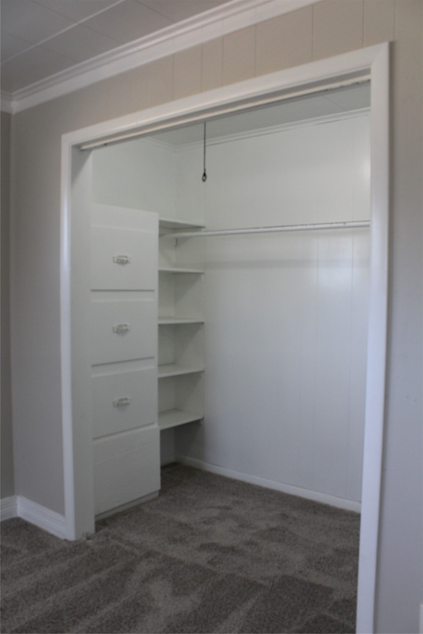 817 Hudler Street La Marque, TX 77568 - Photo 13 of 43 a view of walk in closet with empty racks