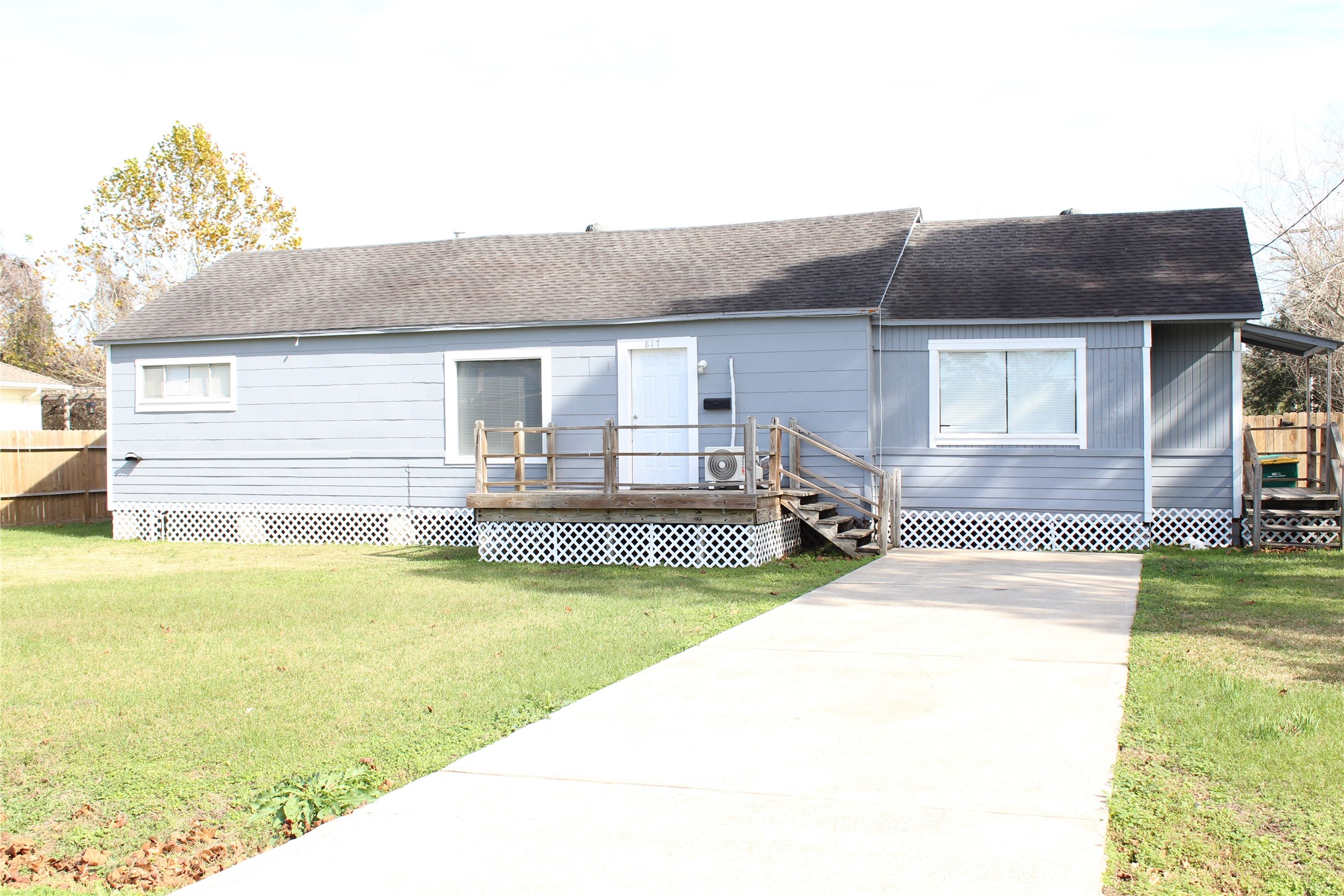 817 Hudler Street La Marque, TX 77568 - Photo 2 of 43 a front view of house with yard and garage