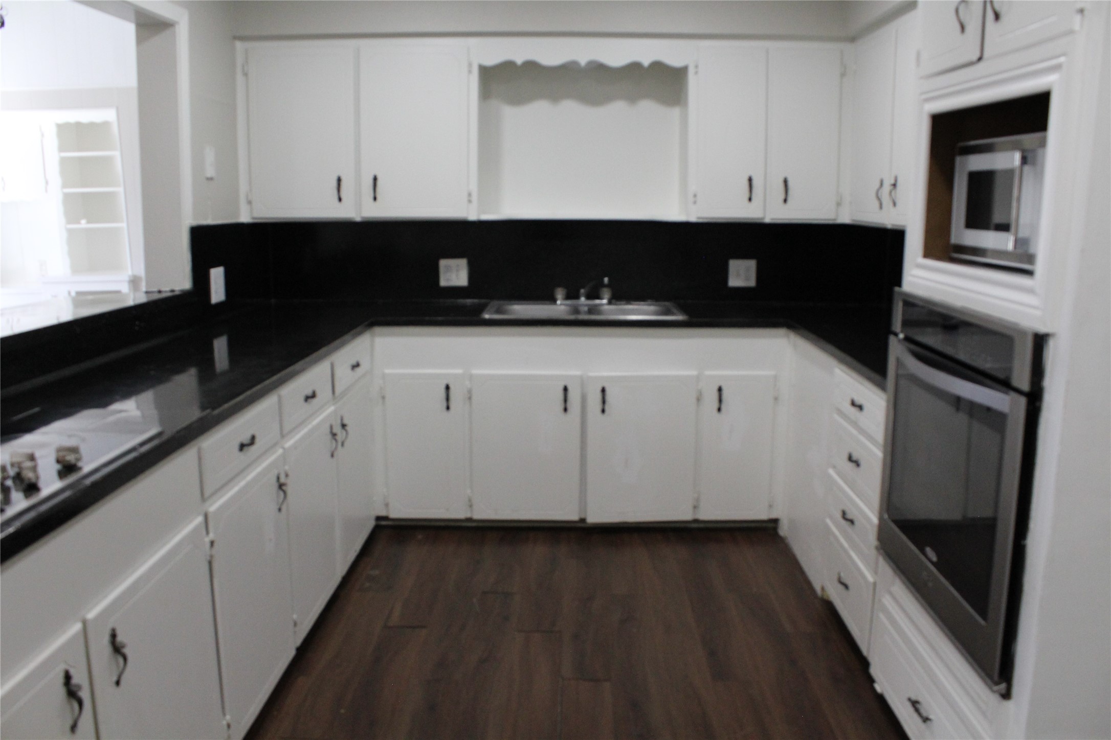 817 Hudler Street La Marque, TX 77568 - Photo 21 of 43 a view of a kitchen with granite countertop stainless steel appliances